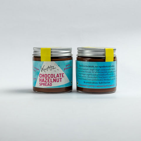 Jar of chocolate hazelnut spread with visible labels on a white background
